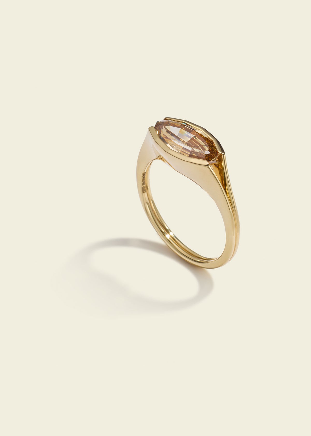 Step cut oval diamond pinky ring