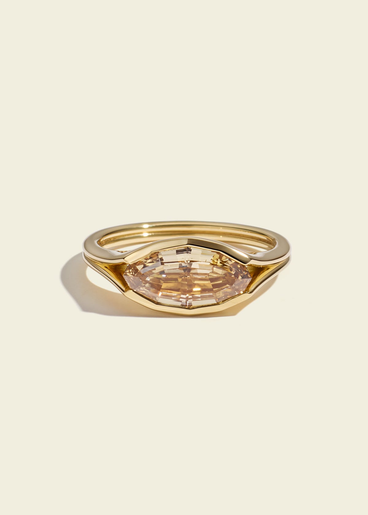 Step cut oval diamond pinky ring