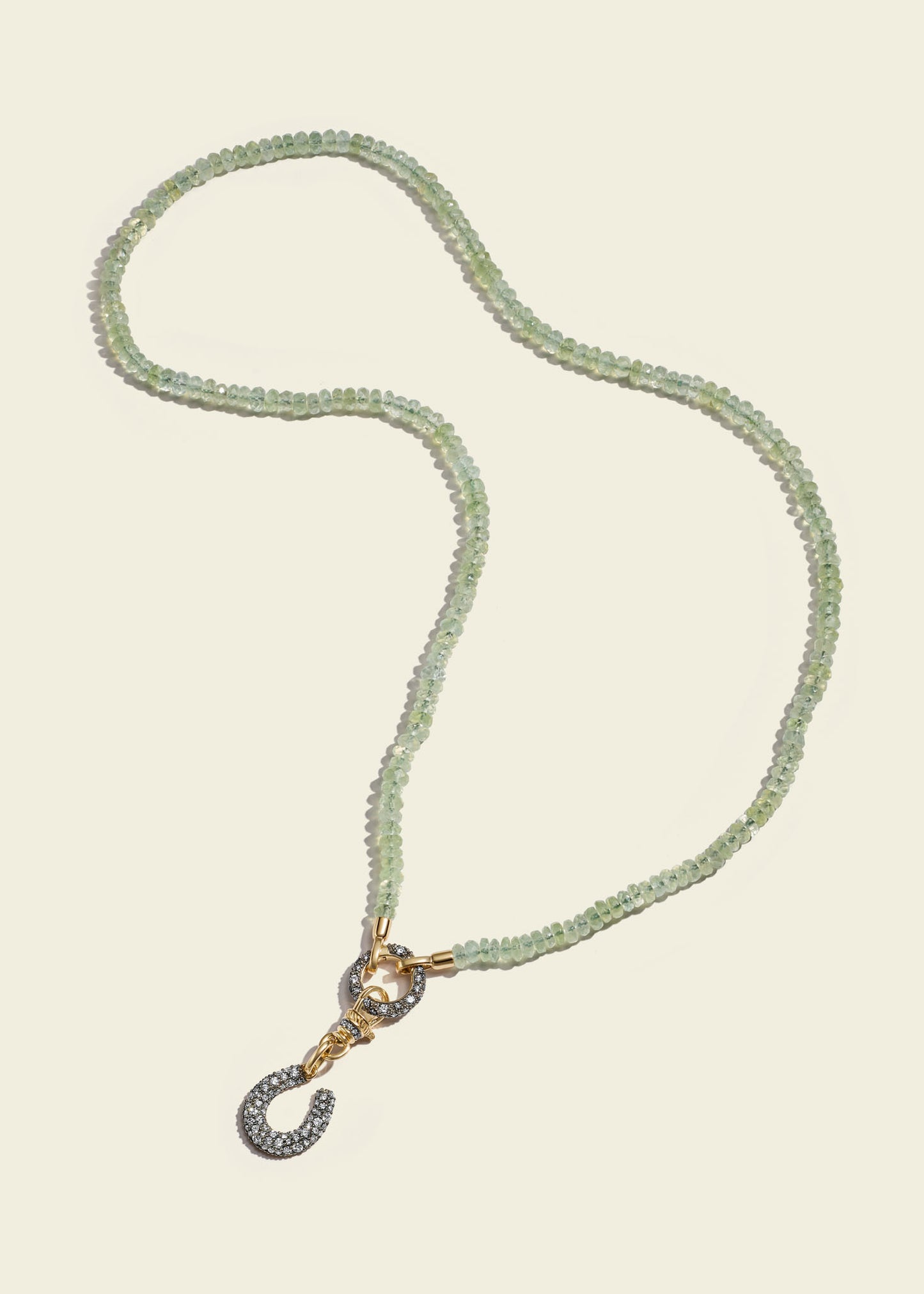 Lucy Delius polished 14ct gold necklace, worn on model