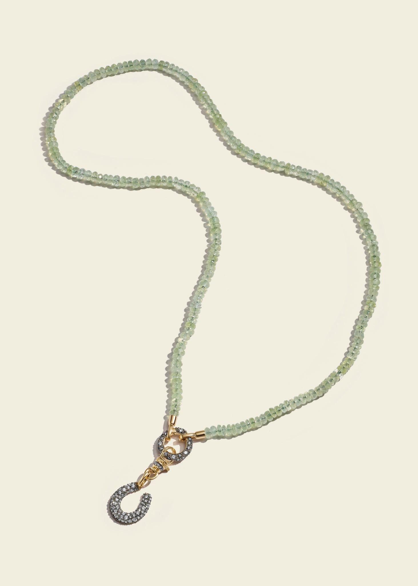 Lucy Delius polished 14ct gold necklace, worn on model