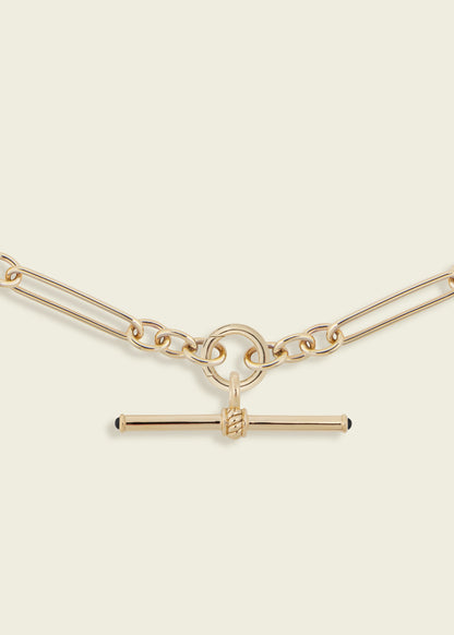 Gold T-Bar with Blue Sapphire Cabochons